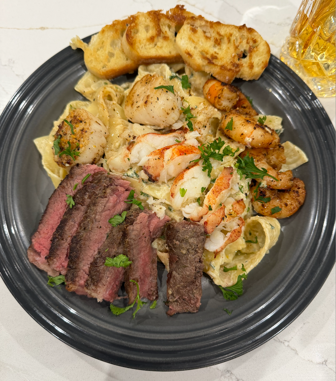 Steak and seafood surf and turf plate